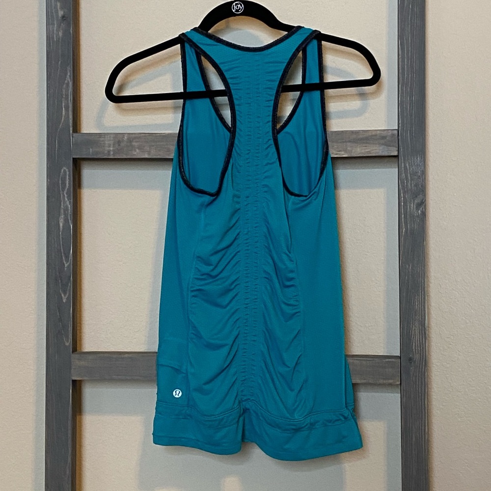 4 Turquoise Lululemon sleeveless workout top